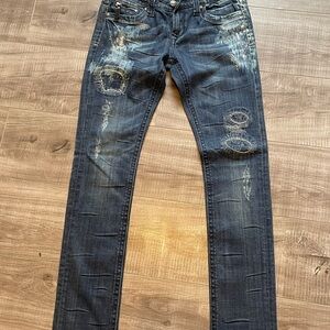 Distressed Denim Jeans